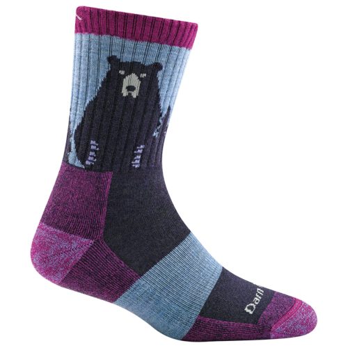 The Darn Tough DARN TOUGH BEAR TOWN PURPLE CREW SOCKS - WOMENS featuring a bear design, crafted in Merino wool. The sock showcases horizontal color blocks of purple, blue, and maroon, perfect for hiking adventures or everyday wear.