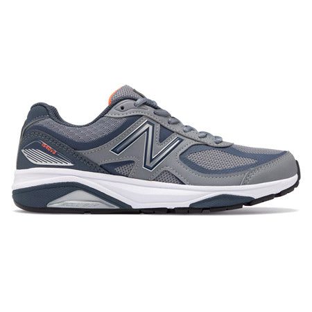 A side view of a gray and navy women's running shoe with a white sole, featuring ENCAP midsole technology for added support and the New Balance logo on the side. The product is called "NEW BALANCE 1540V3 GUNMETAL/DRAGONFLY - WOMENS" by New Balance.