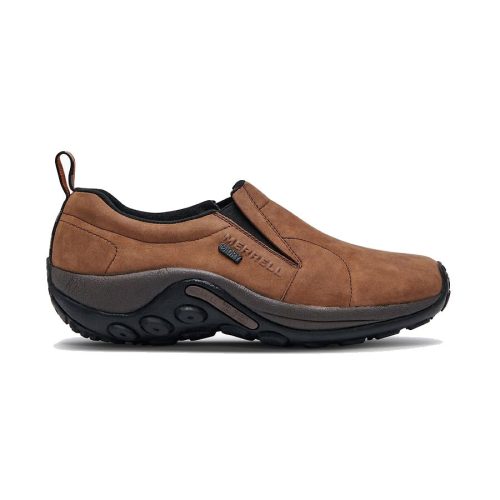 A brown slip-on shoe with a black sole designed for comfort and casual wear, the MERRELL JUNGLE MOC WATERPROOF BROWN - MENS features a nubuck upper and proudly displays the brand name "Merrell" on the side.