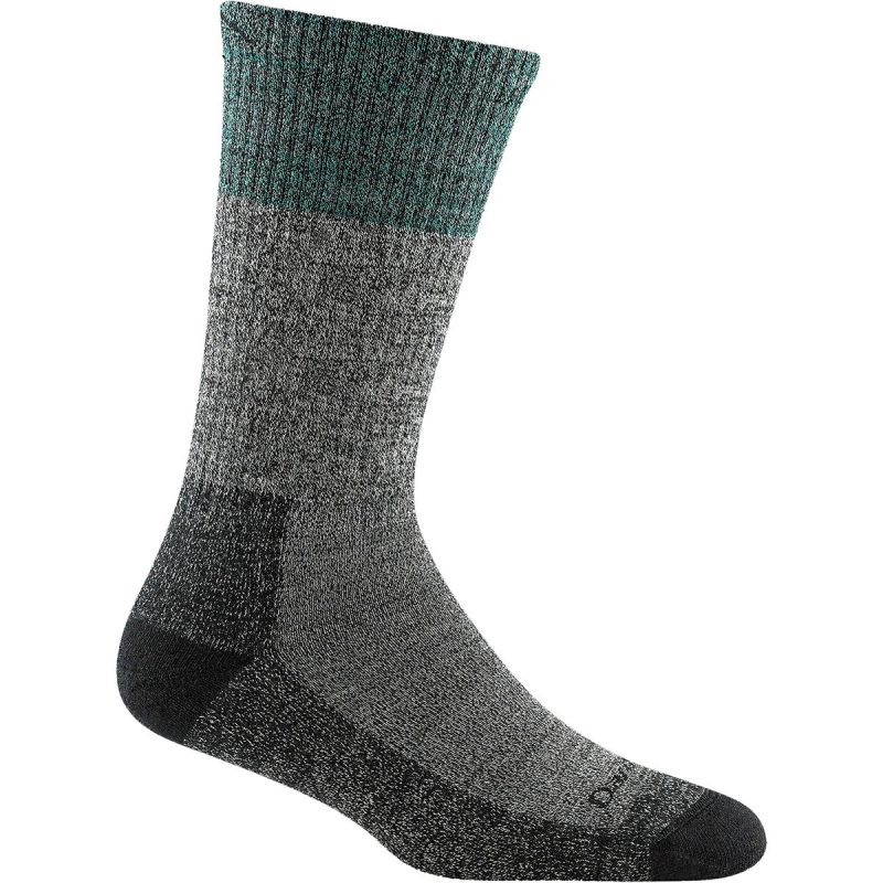 A DARN TOUGH SCOUT BOOT SOCK AQUA by Darn Tough, a grey and black wool hiking sock with a teal top and a reinforced heel and toe, is displayed against a white background. Made from antimicrobial merino wool for ultimate comfort and durability on the trails.