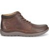 A brown leather lace-up ankle boot with a rubber sole and visible stitching details, the BORN NIGEL BOOT DARK BROWN - MENS by Born embodies a hiker-inspired boot with its durable leather upper.