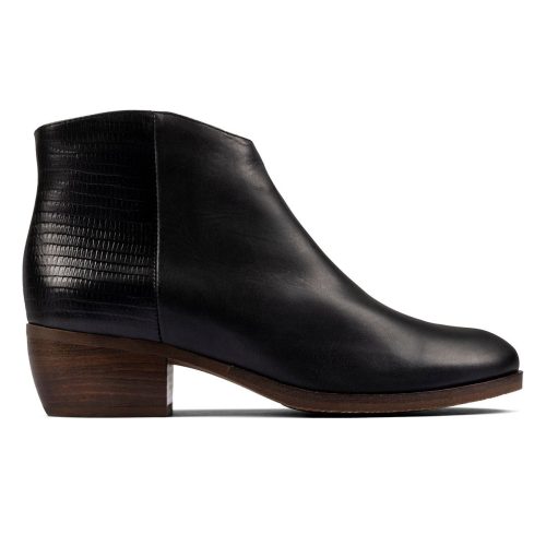 A Clarks women's black leather ankle boot with a low heel, textured back detail, and Cushion Plus technology.