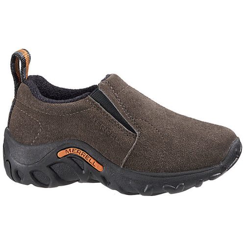 A brown slip-on DARN TOUGH LETTERMAN CREW SOCKS DENIM with a black rugged sole, designed for athletic performance. The sock features a pull tab at the heel, and the brand name "Darn Tough" is visible on the side.