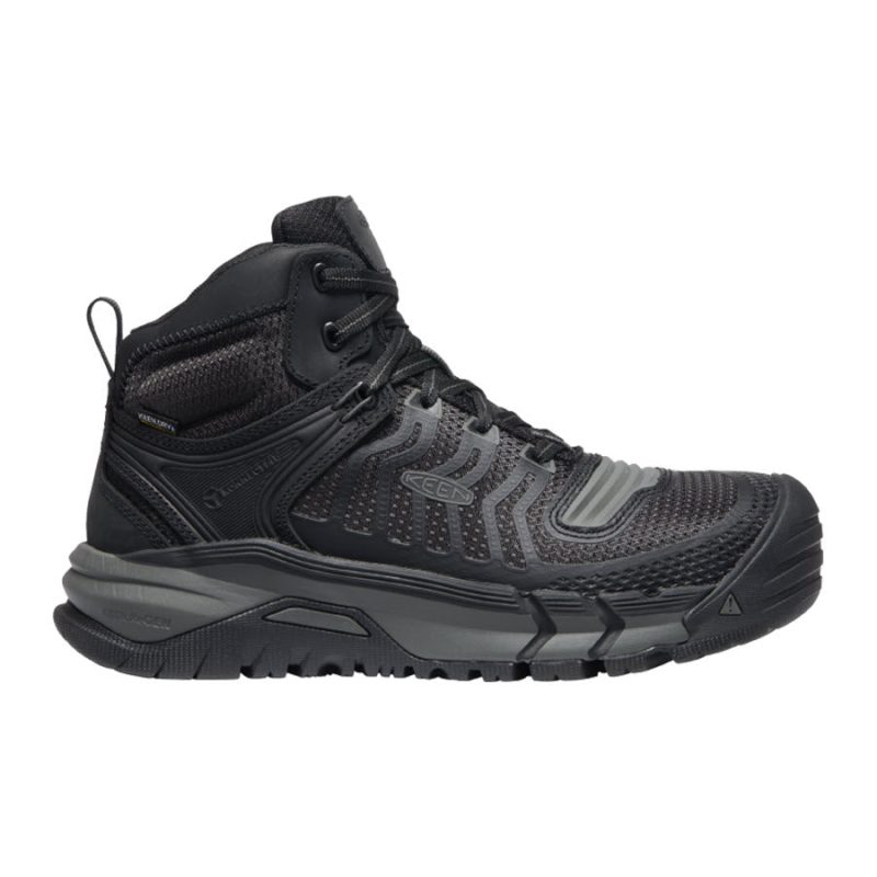 A black and gray high-top athletic shoe with a mesh upper, lace closure, and a thick rubber sole, featuring KEEN.DRY technology for enhanced moisture protection is the KEEN KANSAS CITY MID SAFETY TOE BLACK - MENS by Keen.