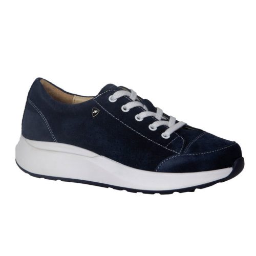 The Xelero XELERO HEIDI DEEP OCEAN - WOMENS is a blue suede athletic walking shoe with white laces, a white sole, and a small circular emblem on the side, featuring a comfortable footbed for all-day wear.