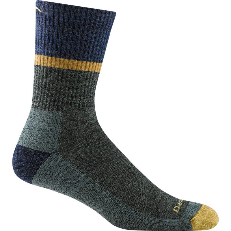 A single DARN TOUGH RANGER MICRO CREW SOCKS FATIGUE with shades of navy, grey, and yellow, featuring a ribbed texture and branded with “Darn Tough” on the toe. Made from Merino Wool, it offers cushioned comfort for all your outdoor adventures.