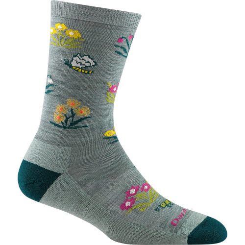 Gray sock with multicolored flower designs, dark green heel and toe, and ‘Darn Tough’ text at the toe. This women's DARN TOUGH COTTAGE BLOOM CREW SOCKS SEAFOAM offers cushioned coziness and adds a touch of Cottage Bloom charm to your wardrobe.