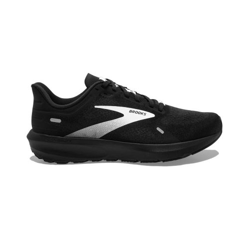 A black lightweight running shoe with white accents, featuring the brand name "Brooks" on the side. The BROOKS LAUNCH 9 BLACK/WHITE - MENS has a low profile, a cushioned sole, and a breathable mesh upper for added comfort.