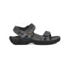 A black and gray sporty sandal with adjustable Velcro straps and a rugged sole, the TEVA HUDSON DARK GULL GREY - MENS by Teva is designed for outdoor activities, ensuring you have durable, comfortable sandals for every adventure.