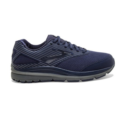 The Brooks Addiction Walker Suede Peacoat for men is a navy blue athletic shoe with a white sole and laces, designed for running, featuring a BioMoGo DNA midsole for superior cushioning.