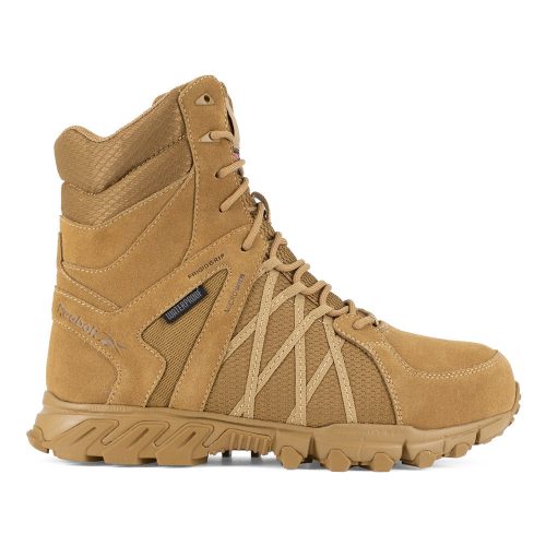 A tan-colored hiking boot with rugged, chunky soles and intricate lace-up design. The Reebok Work REEBOK CT TRAILGRIP TACTICAL ZIP WP TAN - MENS features reinforced stitching, active traction rubber on the soles for superior grip, and multiple textures on the upper for durability and support.