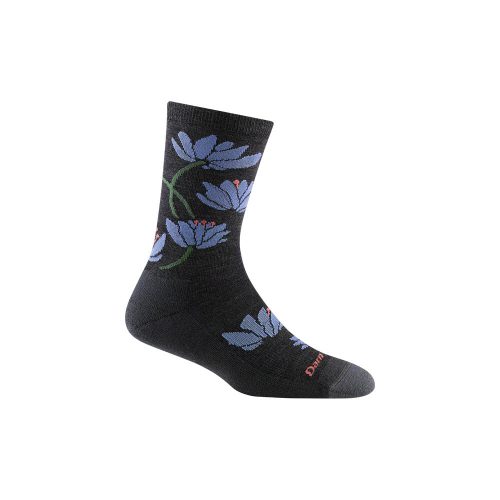 The Darn Tough Lilies Crew Socks Charcoal - Womens is a single black sock with a blue floral design, made from odor-resistant Merino Wool.