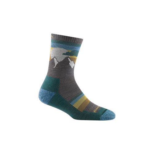 A lightweight hiking sock, the Darn Tough DARN TOUGH LEDGE MICRO CREW SOCKS TAUPE - WOMENS boasts mountain and tree patterns with green, gray, teal, and yellow stripes. Perfect for summer hikes with a cushion under the foot and a reinforced toe and heel for added comfort.