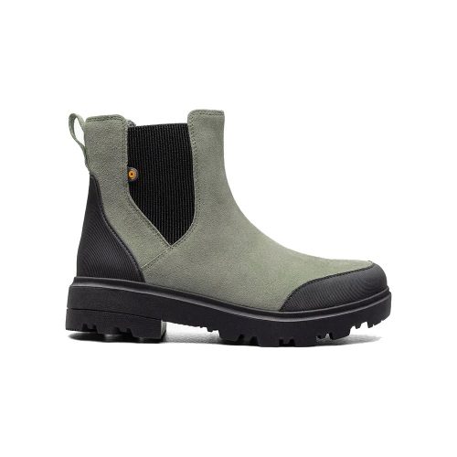 A BOGS HOLLY LEATHER CHELSEA GREEN ASH - WOMENS crafted from gold-certified leather with black elastic side panels, featuring a loop tag at the back and a rugged black sole. This versatile design by Bogs is also waterproof, perfect for any weather.