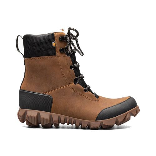 A brown and black Bogs BOGS ARCATA LEATHER CARAMEL - WOMENS with rugged sole, slip-resistant outsoles, and lace-up closure.