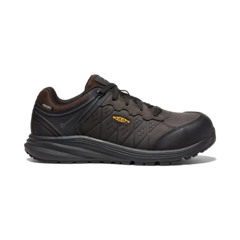 A KEEN CT VISTA ENERGY+ WP COFFEE - MENS athletic shoe with Keen branding, featuring a textured sole, lace-up design, reinforced construction, and a KEEN.DRY membrane for waterproof protection.