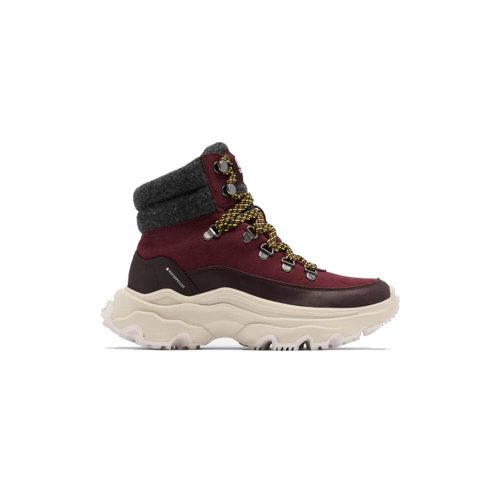 Maroon SOREL KINETIC BREAKTHRU CONQUEST NEW CINDER - WOMENS hiking boot by Sorel with a gray ankle collar, yellow and black laces, thick white sole, and added insulation for extra warmth, viewed from the side.