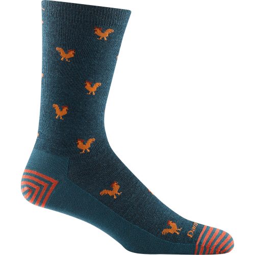 A Darn Tough DARN TOUGH STRUT CREW SOCKS DARK TEAL in blue with orange rooster patterns and striped accents on the toe and heel, crafted from Merino wool for a lightweight no cushion feel.