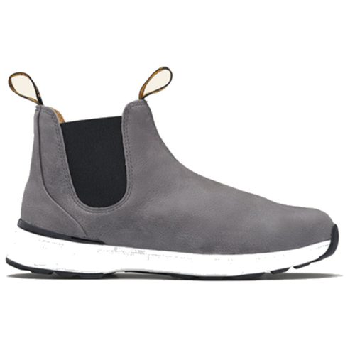 A Blundstone BLUNDSTONE ACTIVE DUSTY GREY - WOMENS slip-on shoe with black elastic side panels and white rubber sole, offering lightweight comfort for all-day wear.