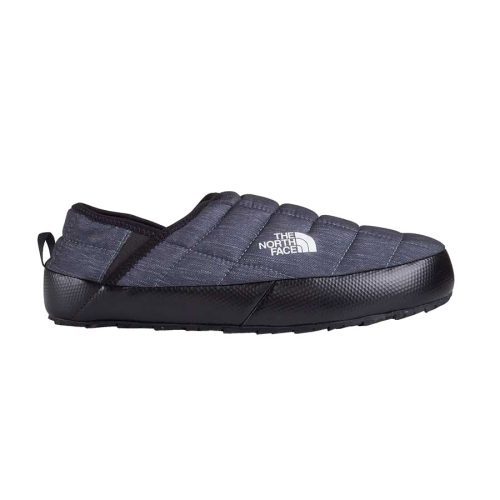 A black and gray slip-on shoe with quilted fabric, featuring the North Face logo on the upper side, ThermoBall™ Eco insulation for added warmth, and a high-traction rubber outsole. This North Face NORTH FACE THERMOBALL MULE V PHANTOM GREY HEATHER - MENS is perfect for cozy comfort and reliable grip.