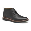 Johnston & Murphy JOHNSTON AND MURPHY UPTON CHUKKA BLACK FULL GRAIN - MENS with a tan interior and brown and white trim around the TRUFOAM™ sole.