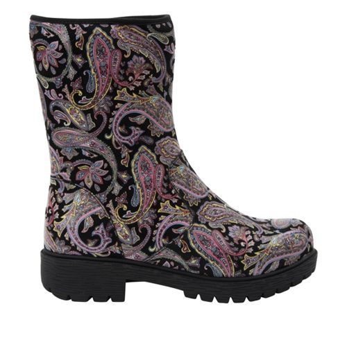 A side view of the ALEGRIA CHALET GROOVY BABY - WOMENS rubber boot by Alegria with a thick black sole. The boot features multicolored paisley designs on a black background and boasts an ergonomic footbed for added comfort.