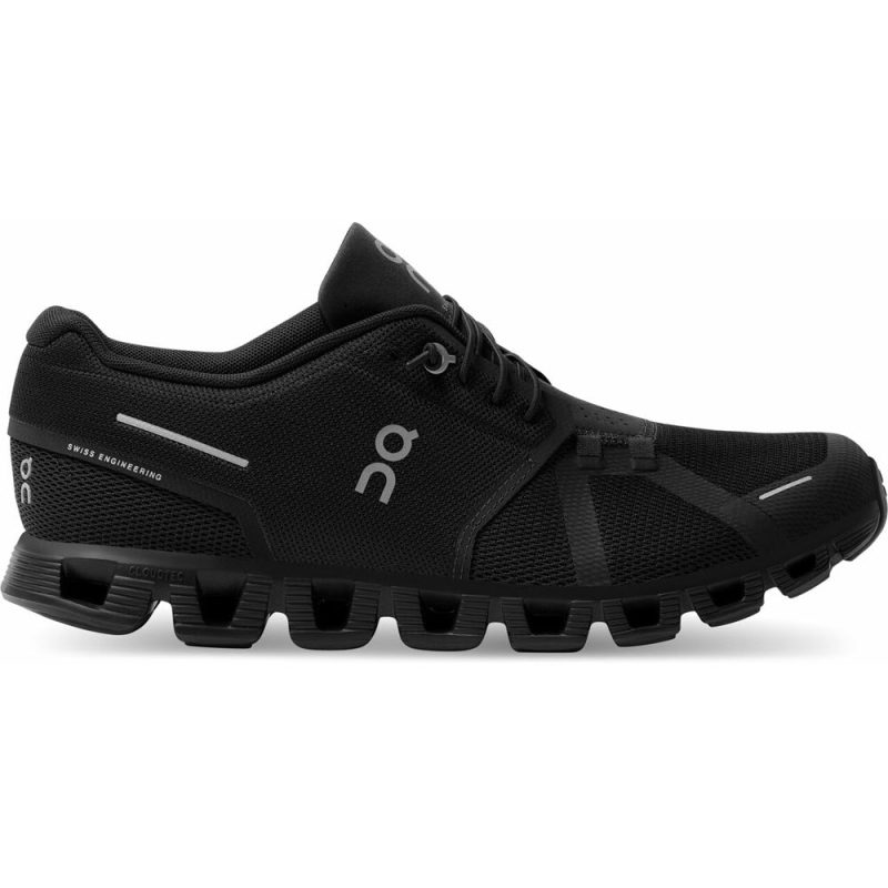 Black athletic running shoe with a unique cushioned sole design featuring Zero-Gravity foam, "On Running" branding, and reflective accents.