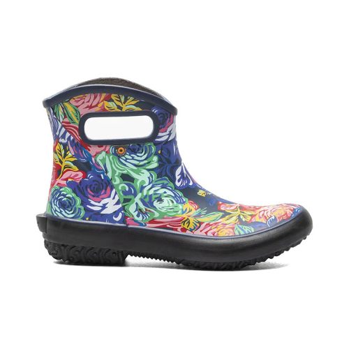 A colorful rain boot with a floral pattern, black sole, and cut-out side handles for easy wearing, featuring an eco-friendly footbed, the Bogs BOGS PATCH ANKLE ROSE GARDEN MULTI - WOMENS combines style and sustainability for women.