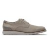 A side view of a beige lace-up ROCKPORT TOTAL MOTION CRAFT PLAIN TOE TAUPE - MENS with an IMEVA sole, designed with leather uppers featuring a smooth texture and gray accents on the heel from Rockport.