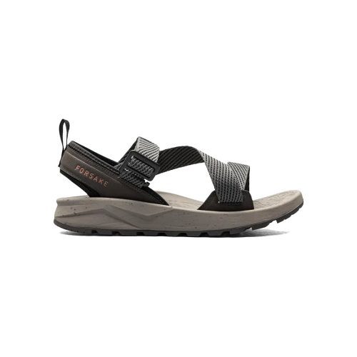 A side view of an adventure sandal with a thick sole, adjustable straps, and the brand name "Forsake" visible on the heel strap. Made with recycled materials, the color scheme is a mix of tan, black, and gray, ensuring both comfort and stability for your journeys. The product is called FORSAKE ROGUE LODEN - MENS by Forsake.