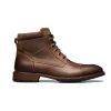 The Florsheim FLORSHEIM LODGE CAP TOE LACE UP CRAZY HORSE - MENS is a brown leather ankle boot featuring a cap toe, sturdy rubber sole, and versatile design, viewed from the side.