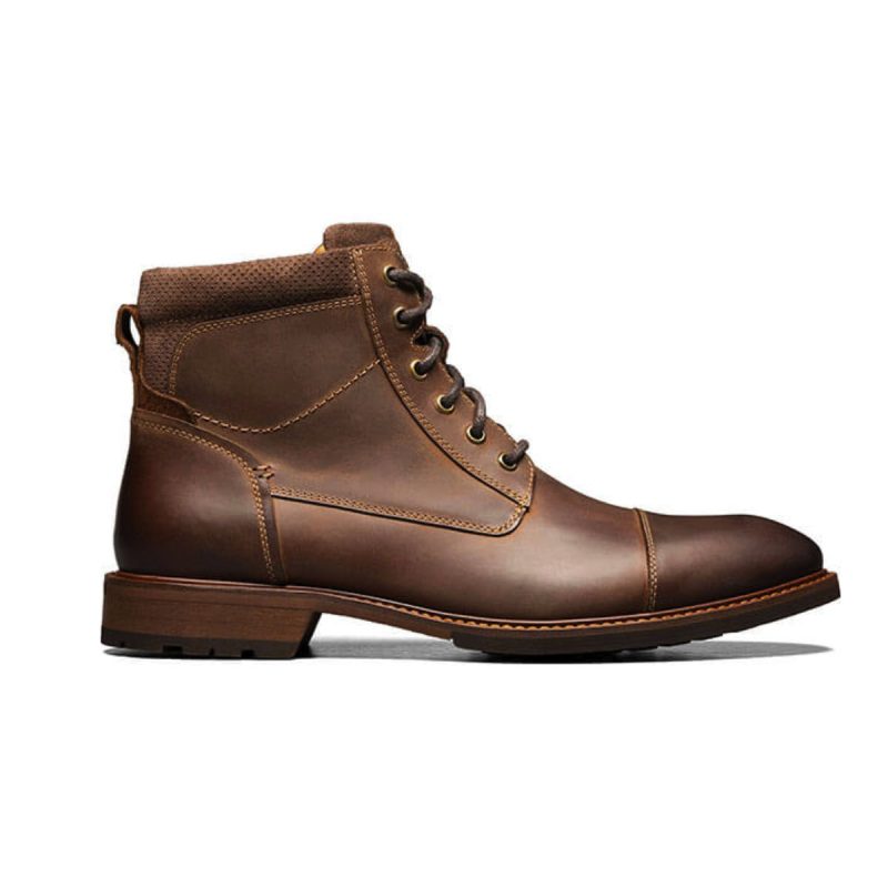 The Florsheim FLORSHEIM LODGE CAP TOE LACE UP CRAZY HORSE - MENS is a brown leather ankle boot featuring a cap toe, sturdy rubber sole, and versatile design, viewed from the side.