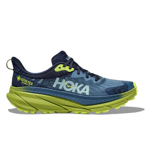 A blue and green HOKA Challenger ATR 7 GTX Outer Space/Dark Citron - Mens running shoe with GORE-TEX material, featuring a thick cushioned sole, improved traction, lace-up design, and prominent Hoka logo on the side.