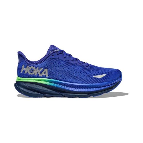 A HOKA CLIFTON 9 GTX DAZZLING BLUE/EVENING SKY - MENS running shoe with green accents on the midsole, featuring the Hoka logo on the side. It offers Gore-Tex® technology, perfect for running in the dark.