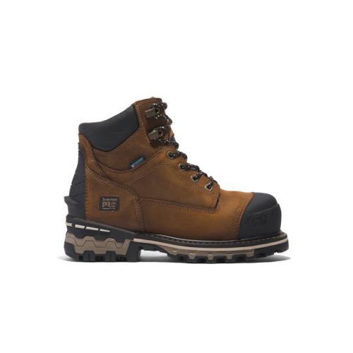 A Timberland TIMBERLAND CT BOONDOCK 6 INCH WATERPROOF BROWN - WOMENS made from premium leather, featuring black rubber toe protection, black lace-up closure, and a thick, rugged sole, displayed against a white background.