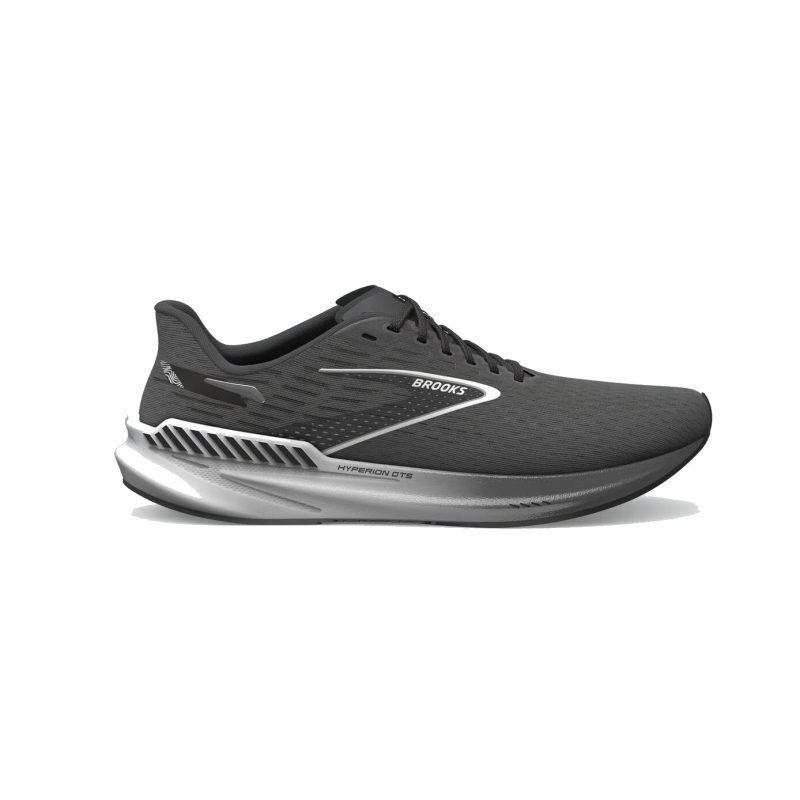 A black athletic running shoe with a white geometric sole design, featuring responsive cushioning and the brand name "Brooks" on the side. The BROOKS HYPERION GTS GUNMETAL/BLACK/WHITE - MENS is the perfect men's training shoe for peak performance.