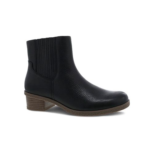 Black ankle boot with a short, stacked heel, featuring Dansko Natural Arch technology and an elastic side panel for easy slip-on style. Introducing the **DANSKO DAISIE BLACK - WOMENS** by **Dansko**.