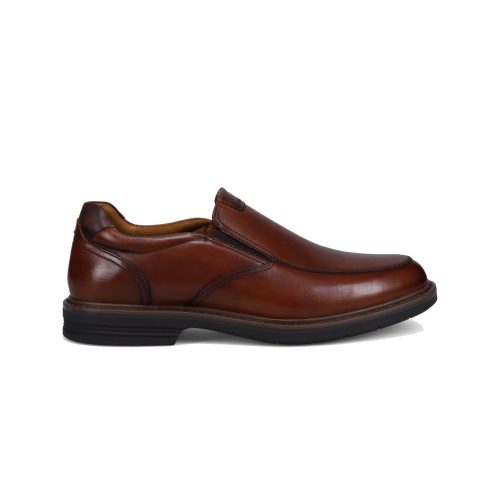 A FLORSEHIM NORWALK MOC TOE SLIP ON COGNAC - MENS by Florsheim showcases a modern silhouette in a side view, making it a versatile shoe for multiple occasions.