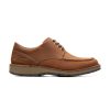 A brown leather Clarks CLARKS GRAVELLE LOW LACE OXFORD DARK BROWN NUBUCK - MENS with a cushioned sole featuring Active Air technology and visible stitching details, shown in a side view.