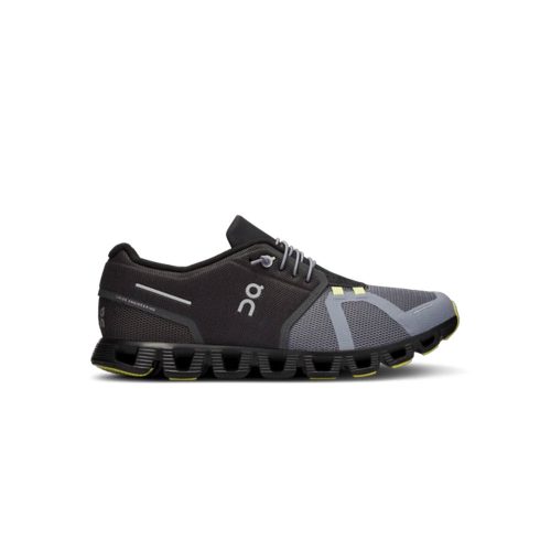 A side view of a black and gray ON RUNNING CLOUD 5 MAGNET/FOSSIL - MENS athletic shoe with a unique sole design and "On Running" brand logo. The shoe features lightweight mesh fabric, laces, and yellow accents on the sole, providing exceptional cushioning for enhanced comfort.