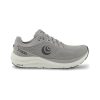 The TOPO PHANTOM 3 GREY/GREY - MENS by Topo Designs is a gray athletic shoe featuring a white sole, ZipFoam cushioning, and engineered mesh for breathability. It also showcases the brand logo on the side and "Topo" marked near the heel.