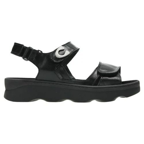 A Wolky WOLKY MEDUSA BLACK - WOMENS travel sandal with adjustable velcro straps, a velcro closure, and a thick, padded sole.