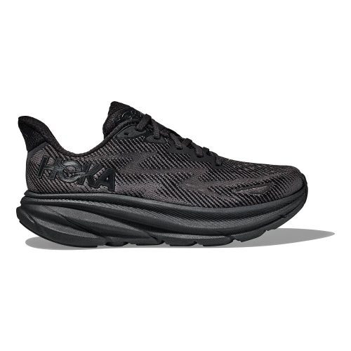 A black HOKA CLIFTON 9 BLACK/BLACK - MENS running shoe with a thick, cushioned sole and a textured upper, featuring responsive foam and an improved outsole design, shown from the side profile against a white background.