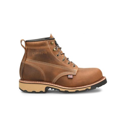 A CAROLINA FERRIC USA 6" STEEL TOE WORK BOOT BROWN - MENS, featuring the brand name 'Carolina' on the side. This men’s steel toe work boot boasts an oil- and slip-resisting outsole, emphasizing its rugged durability.