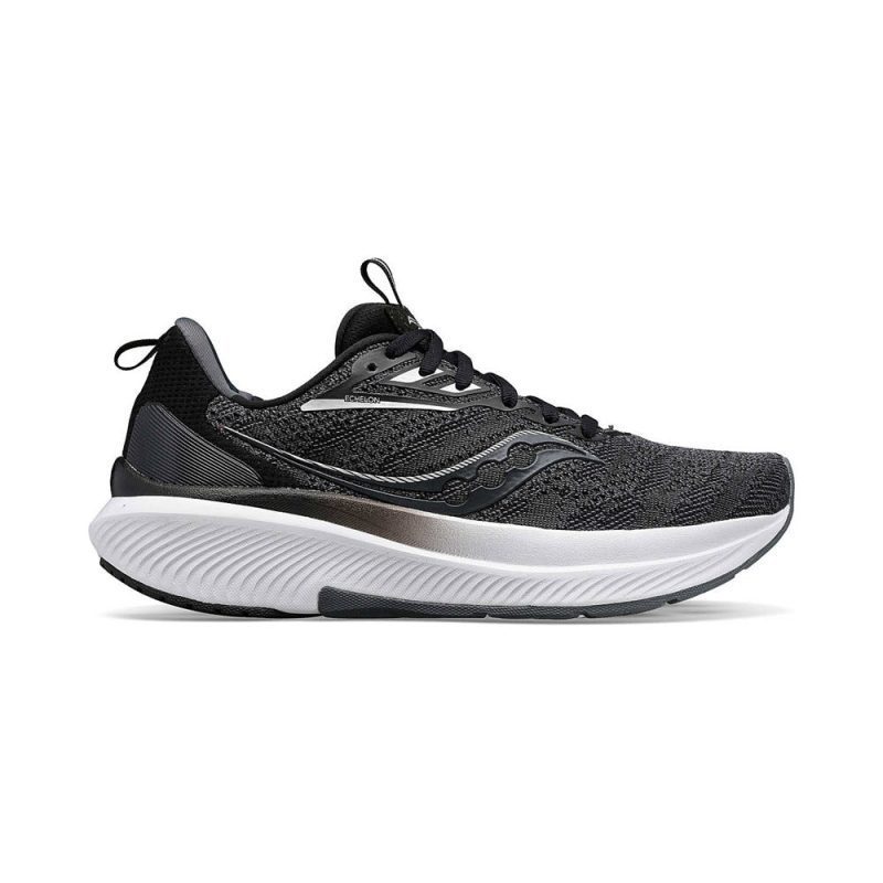 A Saucony SAUCONY ECHELON 9 BLACK/WHITE - MENS shoe with a white and black sole, featuring a wavy pattern on the side and a pull tab at the heel, designed for max cushioning suitable for use with orthotics.