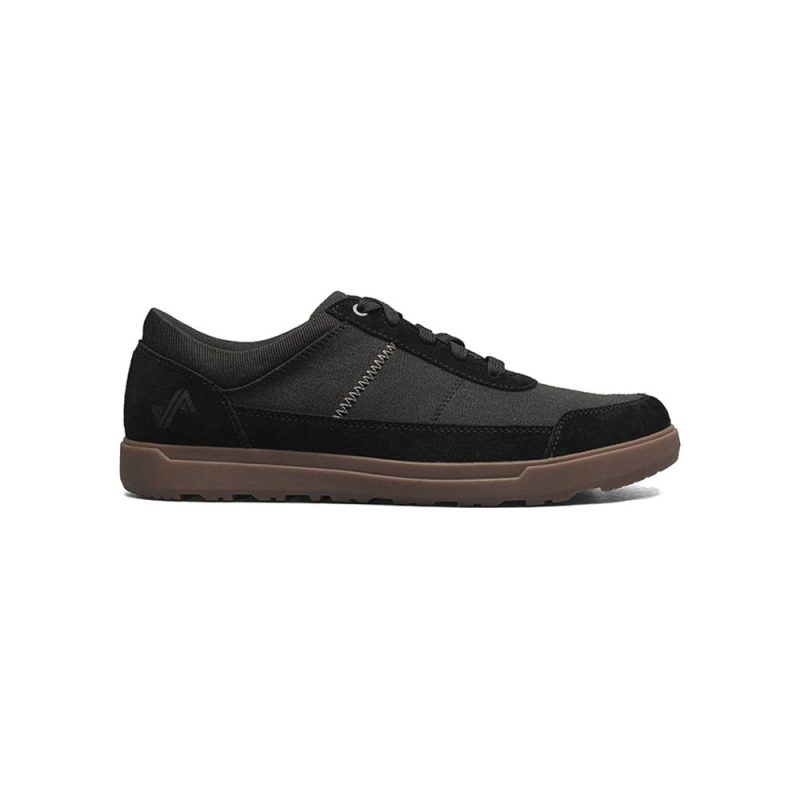 Forsake FORSAKE MASON LOW WAXED CANVAS OXFORD BLACK - MENS with a breathable suede canvas upper and lace-up closure, featuring a brown rubber sole and Peak-to-Pavement tread, viewed from the side on a white background.