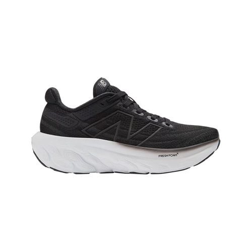 A black athletic shoe with a white sole, designed for running. The shoe has the New Balance logo on the side and features Fresh Foam X technology with an engineered mesh upper for optimal breathability and comfort. This is the NEW BALANCE 1080 V13 BLACK/WHITE - KIDS by New Balance.