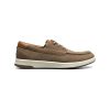 A single Florsheim Crossover Moc Toe boat shoe in mushroom nubuck leather with white laces and a light gray sole, displayed against a white background.