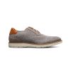 A side view of a Florsheim FLORSHEIM VIBE KNIT PLAIN TOE OXFORD GRAY - MENS with a perforated upper, white sole, tan heel accent, and Comfortech footbed.