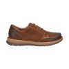 Brown **BORN BRONSON LACE OXFORD TAN SADDLE - MENS** by **Born**, featuring a leather upper and foam-cushioned footbed for added comfort, leather lace-up casual shoes with a textured rubber sole, visible stitching, and a rounded toe.